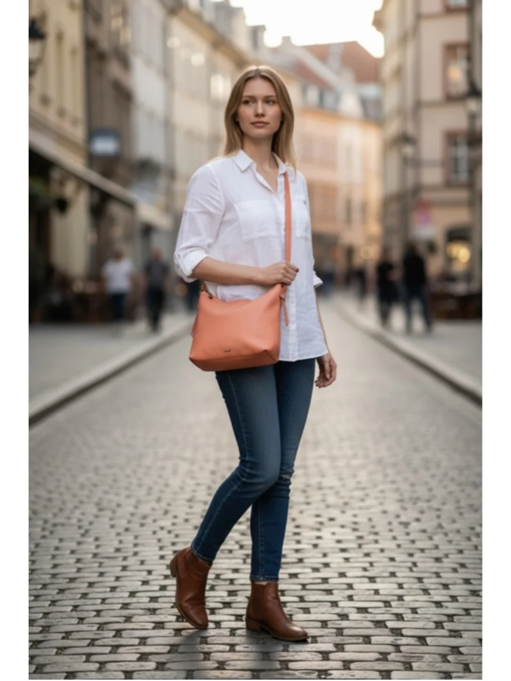 The Sak Jasmine orange leather hobo crossbody bag